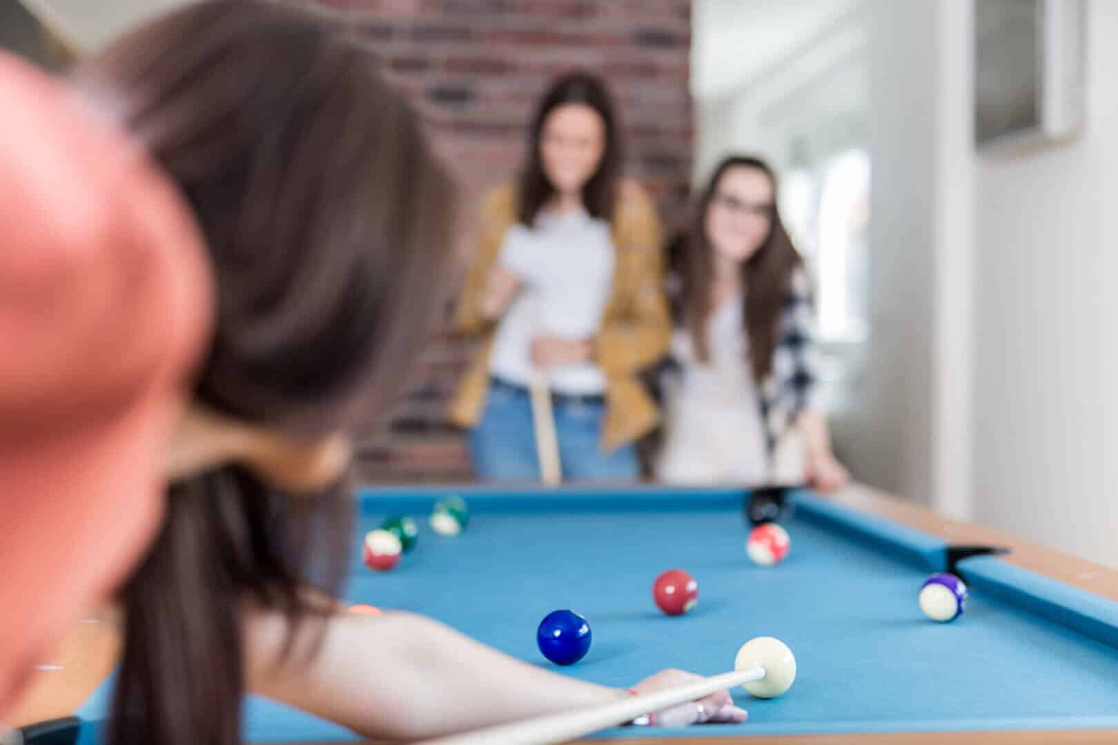 Girl Playing Billards